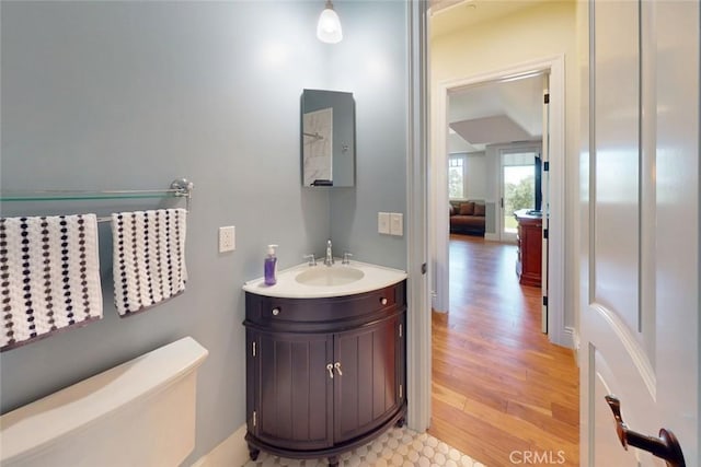 2483 Manhattan Bar Rd, Auburn, CA 95603 - bathroom with vanity, wood finished floors, toilet, and lofted ceiling
