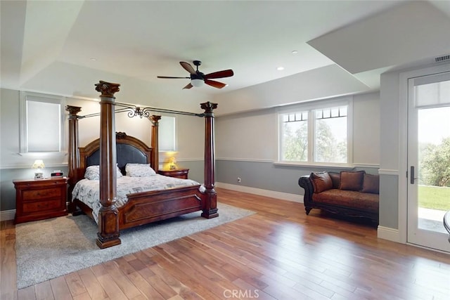 2483 Manhattan Bar Rd, Auburn, CA 95603 - bedroom featuring access to outside, hardwood / wood-style flooring, baseboards, and a ceiling fan