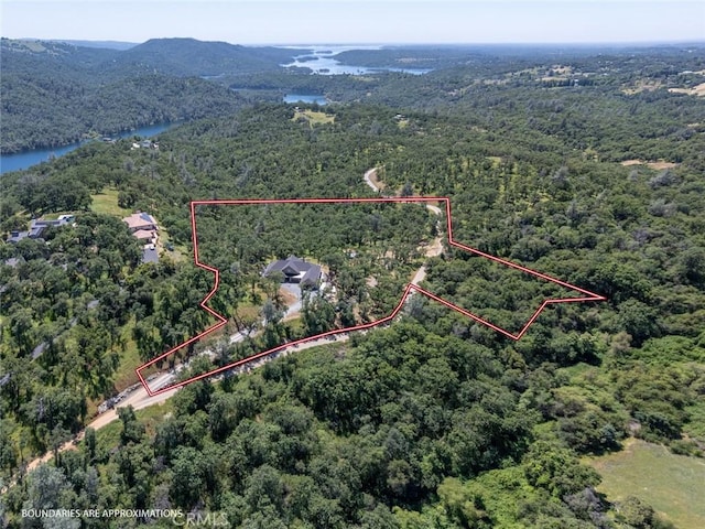 2483 Manhattan Bar Rd, Auburn, CA 95603 - aerial overview of property's location with a forest, a water and mountain view, and property parcel outlined