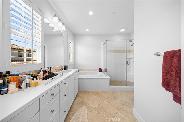 63 Birmingham, Irvine, CA 92620 - full bathroom with a garden tub, a stall shower, vanity, recessed lighting, and tile patterned floors