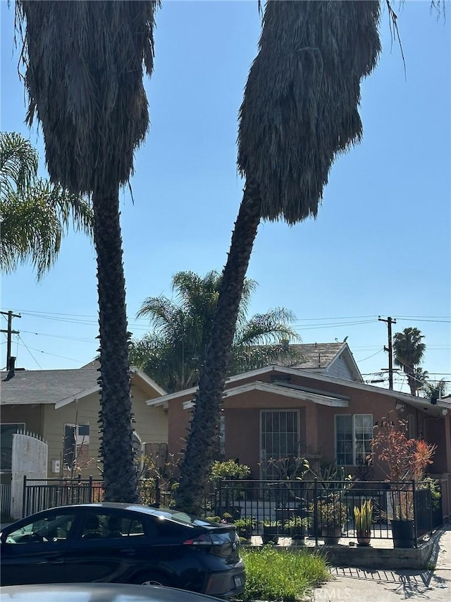 view of front of home with fence