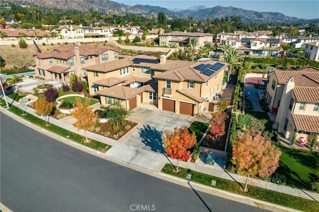 aerial view featuring a mountain view and a residential view