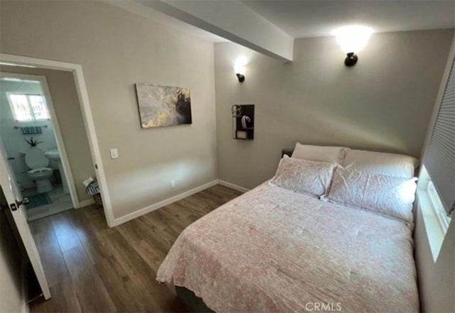 bedroom with baseboards and dark wood-style flooring