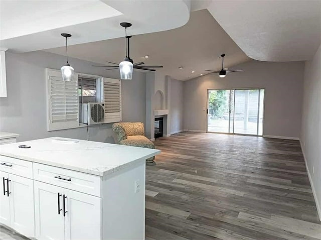68430 Concepcion Rd, Cathedral City, CA 92234 - kitchen featuring a fireplace, open floor plan, a ceiling fan, and plenty of natural light