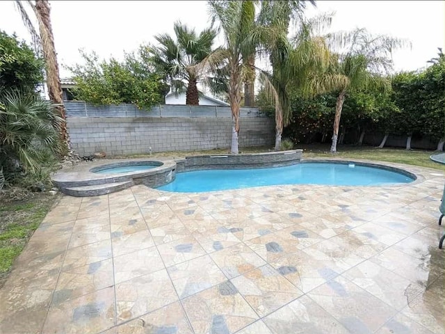 68430 Concepcion Rd, Cathedral City, CA 92234 - view of pool with a patio area, a pool with connected hot tub, and fence