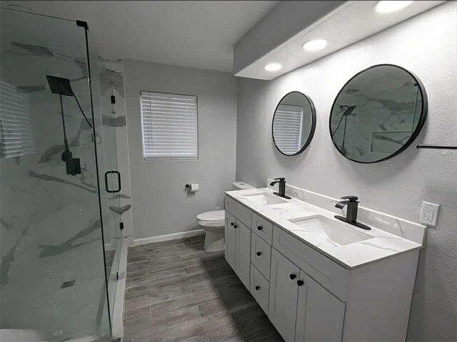 68430 Concepcion Rd, Cathedral City, CA 92234 - bathroom featuring baseboards, a sink, and a marble finish shower