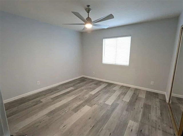 68430 Concepcion Rd, Cathedral City, CA 92234 - spare room featuring wood finished floors, baseboards, and a ceiling fan