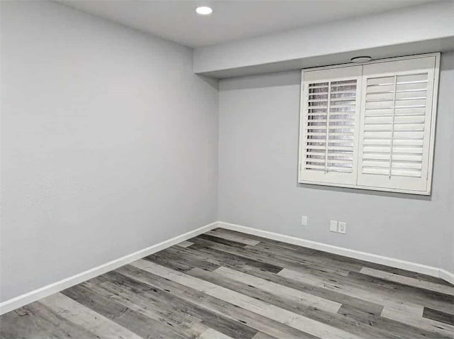 68430 Concepcion Rd, Cathedral City, CA 92234 - unfurnished room with baseboards, recessed lighting, and wood finished floors