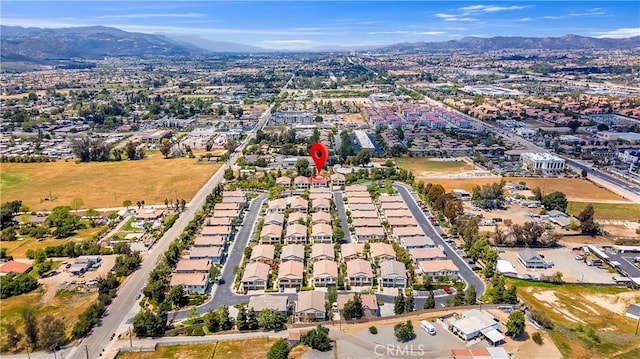 drone / aerial view featuring a mountain view