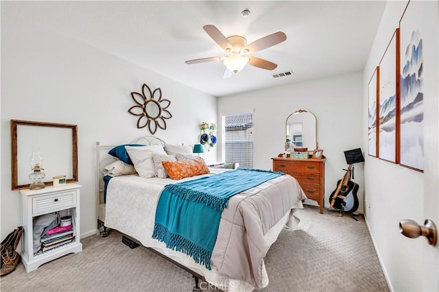 bedroom featuring ceiling fan, carpet flooring, baseboards, and visible vents