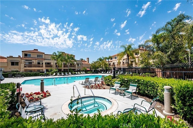 28215 Via Luis, Laguna Niguel, CA 92677 - community pool with fence, a community hot tub, and a patio