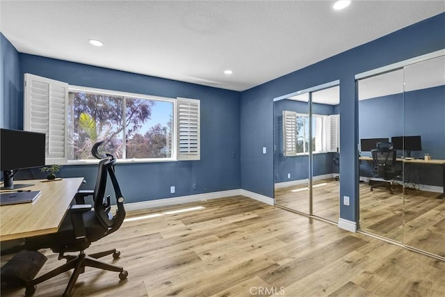 office area featuring wood finished floors, baseboards, and recessed lighting