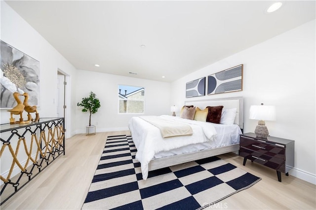 737 Lewis St, Pomona, CA 91768 - bedroom featuring baseboards, recessed lighting, and wood finished floors