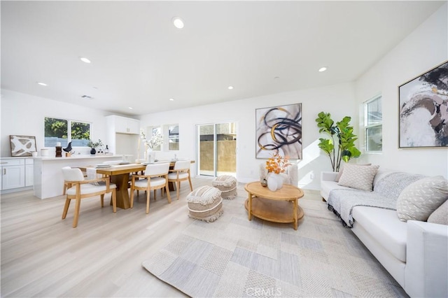 737 Lewis St, Pomona, CA 91768 - living area featuring visible vents, light wood-style flooring, and recessed lighting