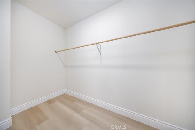 737 Lewis St, Pomona, CA 91768 - walk in closet with light wood finished floors