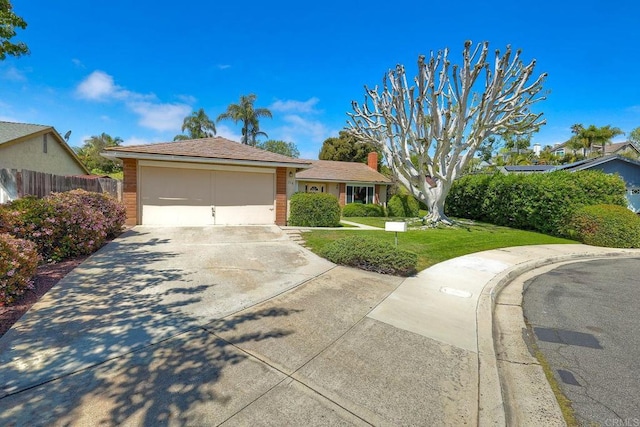 single story home with driveway, brick siding, fence, an attached garage, and a front yard