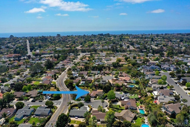 birds eye view of property with a residential view
