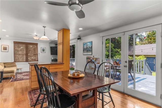 dining area with light wood-style floors, french doors, ceiling fan, and recessed lighting