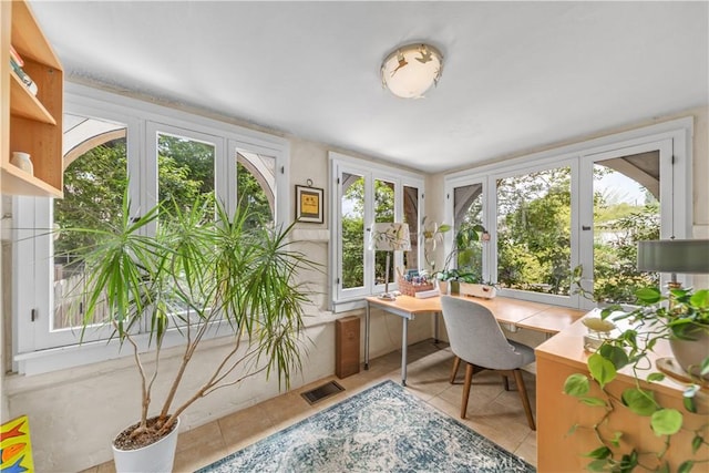 office featuring tile patterned flooring, french doors, and visible vents