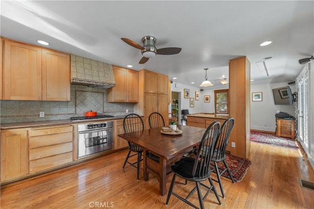 dining area with a ceiling fan, recessed lighting, baseboards, light wood finished floors, and visible vents