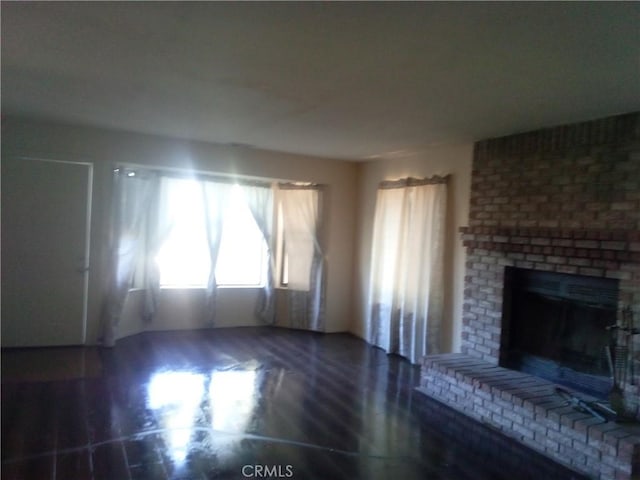 23171 Woodford Tehachapi Rd, Tehachapi, CA 93561 - unfurnished living room with a brick fireplace