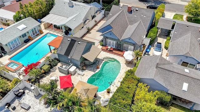 drone / aerial view with a residential view