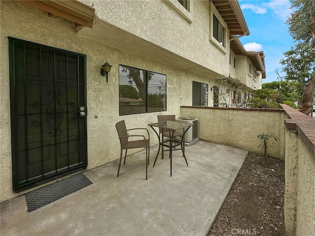 view of patio featuring central air condition unit