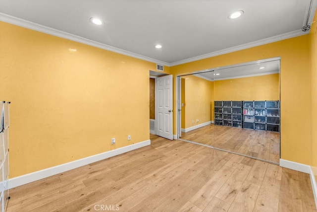 1344 5th St Unit 7, Glendale, CA 91201 - below grade area with crown molding, baseboards, wood-type flooring, and recessed lighting