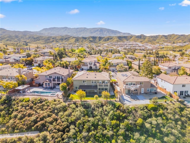 drone / aerial view with a mountain view and a residential view