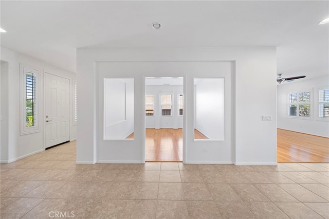 entrance foyer featuring light tile patterned flooring, baseboards, recessed lighting, and a ceiling fan