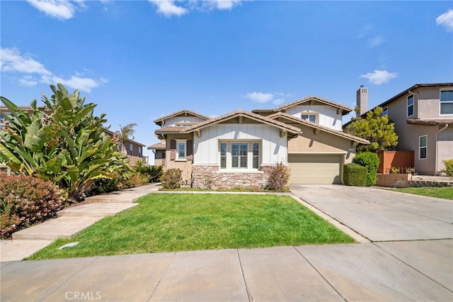 craftsman inspired home featuring driveway, a front lawn, stone siding, and board and batten siding
