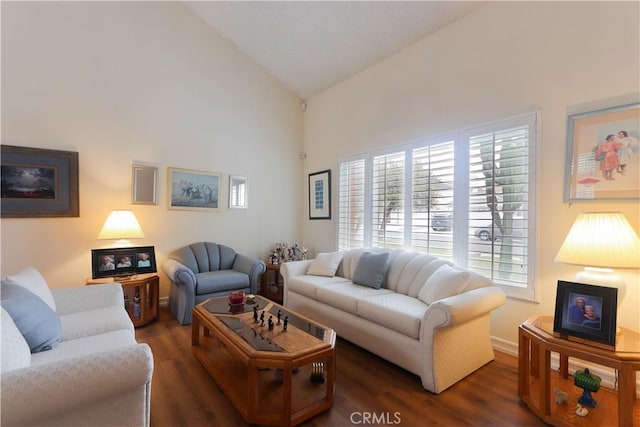 12592 Arlington Pl, Chino, CA 91710 - living room with high vaulted ceiling, wood finished floors, and baseboards