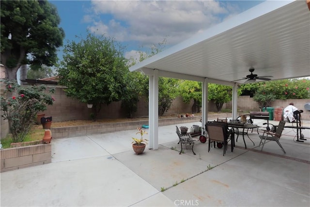 12592 Arlington Pl, Chino, CA 91710 - fenced backyard with a ceiling fan, outdoor dining space, and a patio