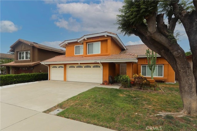 12592 Arlington Pl, Chino, CA 91710 - view of front of house with a tiled roof, concrete driveway, a front yard, and stucco siding