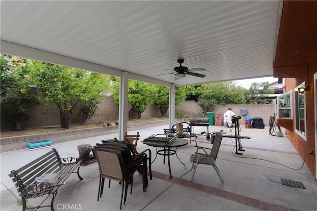 12592 Arlington Pl, Chino, CA 91710 - fenced backyard with a patio and a ceiling fan