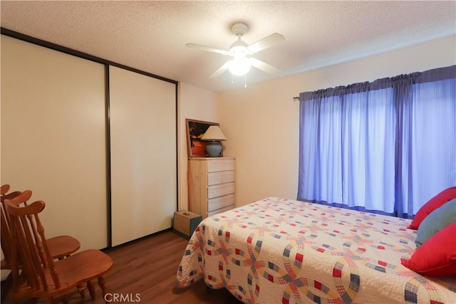 12592 Arlington Pl, Chino, CA 91710 - bedroom with wood finished floors, a textured ceiling, a closet, and ceiling fan