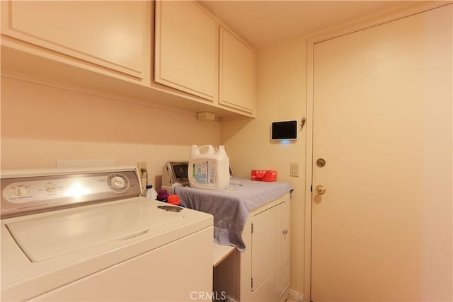 12592 Arlington Pl, Chino, CA 91710 - washroom featuring separate washer and dryer and cabinet space