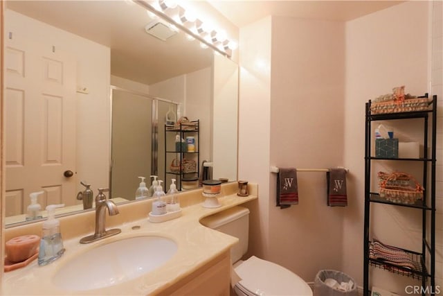 12592 Arlington Pl, Chino, CA 91710 - full bath featuring toilet, a stall shower, and vanity