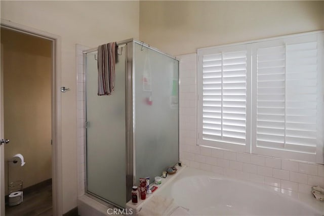 12592 Arlington Pl, Chino, CA 91710 - full bath featuring a shower stall and a bath