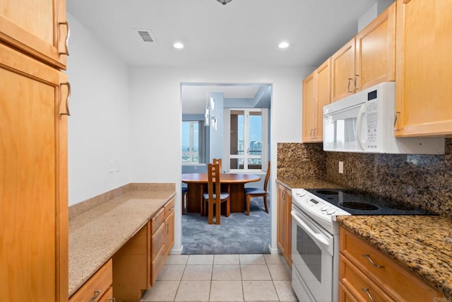 3890 Nobel Dr Unit 1706, San Diego, CA 92122 - kitchen with white appliances, light colored carpet, light stone countertops, light brown cabinets, and light tile patterned floors