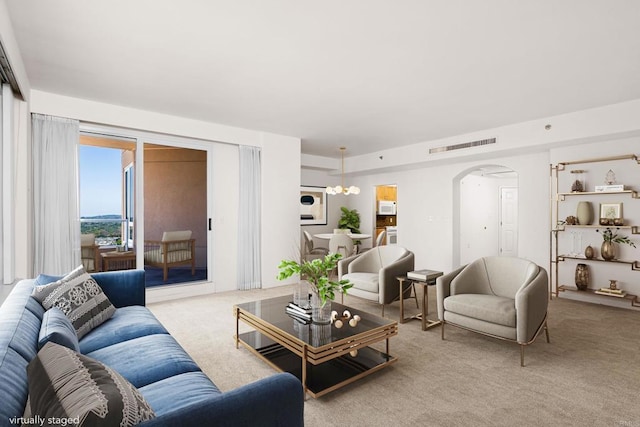 3890 Nobel Dr Unit 1706, San Diego, CA 92122 - carpeted living room featuring arched walkways