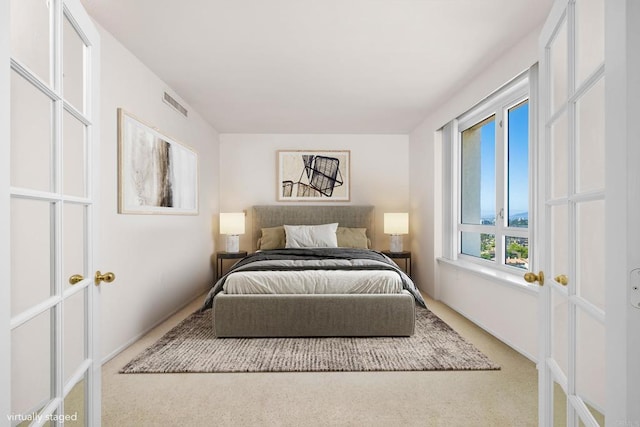 3890 Nobel Dr Unit 1706, San Diego, CA 92122 - carpeted bedroom featuring french doors