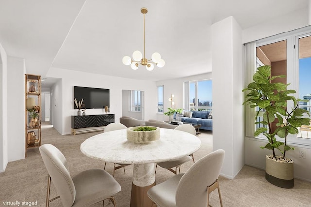3890 Nobel Dr Unit 1706, San Diego, CA 92122 - dining area featuring light carpet, healthy amount of natural light, and a chandelier
