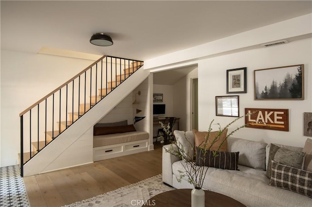 920 Oak Rd, Lake Arrowhead, CA 92385 - living room with visible vents, wood finished floors, and stairs