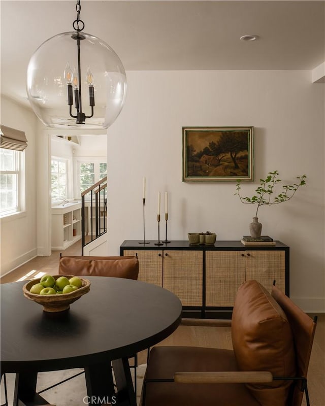 920 Oak Rd, Lake Arrowhead, CA 92385 - dining area with an inviting chandelier and baseboards