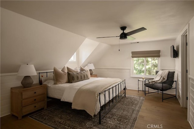 920 Oak Rd, Lake Arrowhead, CA 92385 - bedroom with a ceiling fan, visible vents, wood finished floors, and wainscoting