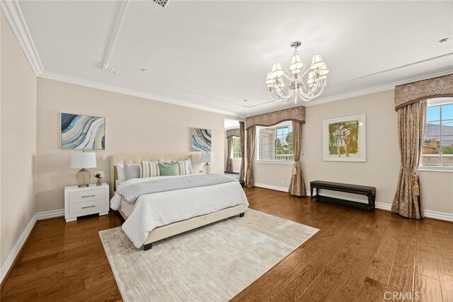 67 W Wistaria Ave, Arcadia, CA 91007 - bedroom with a chandelier, wood finished floors, baseboards, and crown molding