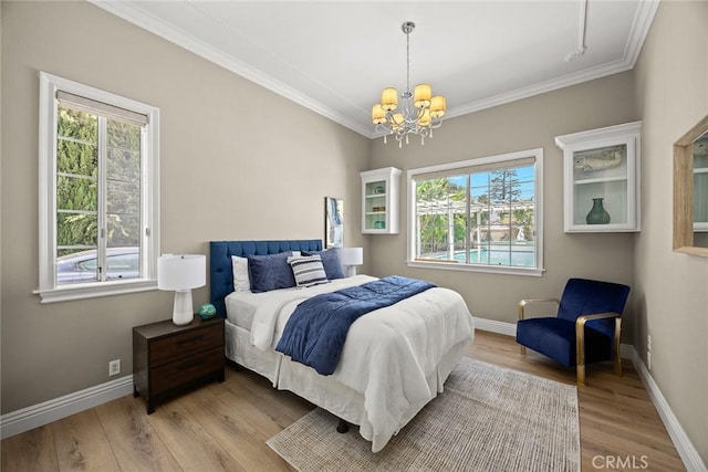 67 W Wistaria Ave, Arcadia, CA 91007 - bedroom featuring a chandelier, ornamental molding, light wood-style floors, and baseboards