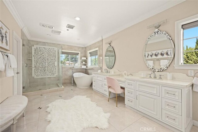 67 W Wistaria Ave, Arcadia, CA 91007 - full bathroom featuring a stall shower, tile patterned flooring, double vanity, a freestanding bath, and ornamental molding