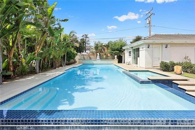 67 W Wistaria Ave, Arcadia, CA 91007 - view of pool with a pool with connected hot tub